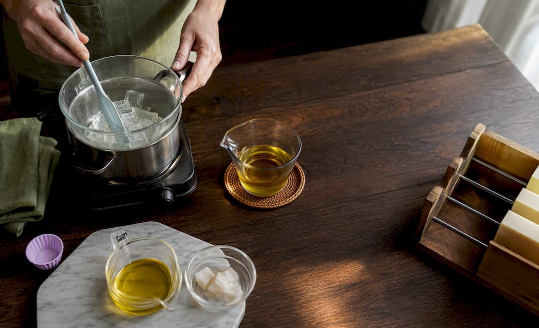 Two soapmaking methods arranged on a workbench